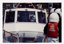 U.S. Coast Guard Auxiliary Boating Safety mascots wearing life jackets